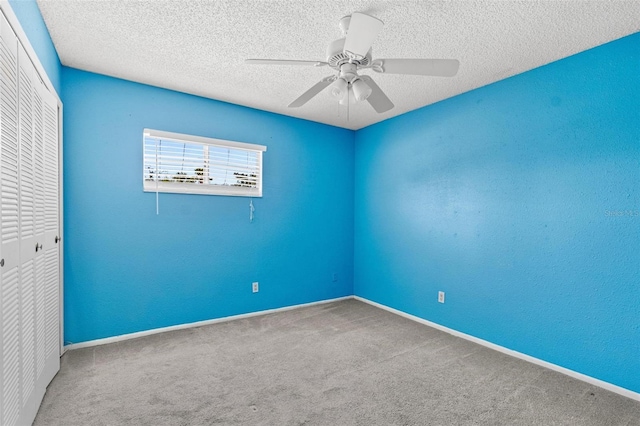 1813 Bough Ave Unit B, Clearwater, FL 33760 - unfurnished room featuring carpet, a ceiling fan, and a textured ceiling