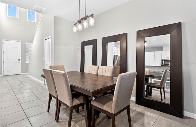 33854 Floating Heart Ct, Wesley Chapel, FL 33545 - dining area featuring light tile patterned floors