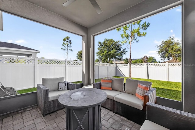 33854 Floating Heart Ct, Wesley Chapel, FL 33545 - sunroom / solarium featuring ceiling fan and an outdoor living space