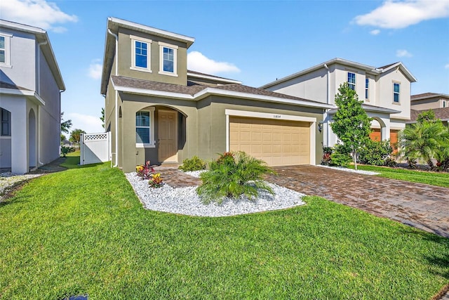 33854 Floating Heart Ct, Wesley Chapel, FL 33545 - traditional home with stucco siding, a garage, and driveway