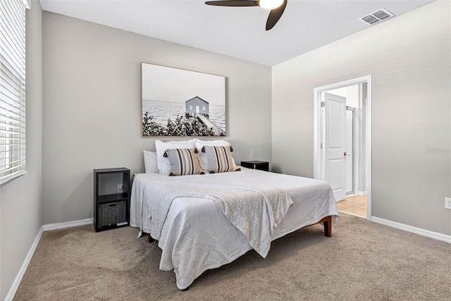 33854 Floating Heart Ct, Wesley Chapel, FL 33545 - bedroom with light carpet and ceiling fan