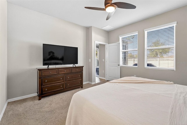33854 Floating Heart Ct, Wesley Chapel, FL 33545 - bedroom with light carpet and ceiling fan