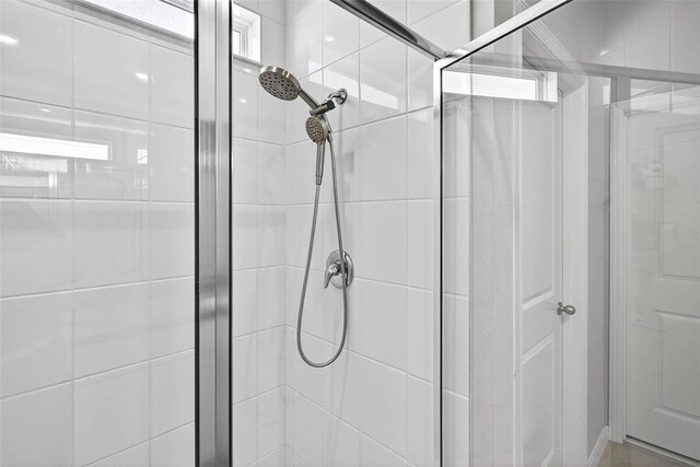 33854 Floating Heart Ct, Wesley Chapel, FL 33545 - bathroom featuring a stall shower