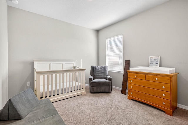 33854 Floating Heart Ct, Wesley Chapel, FL 33545 - bedroom featuring carpet flooring and a crib