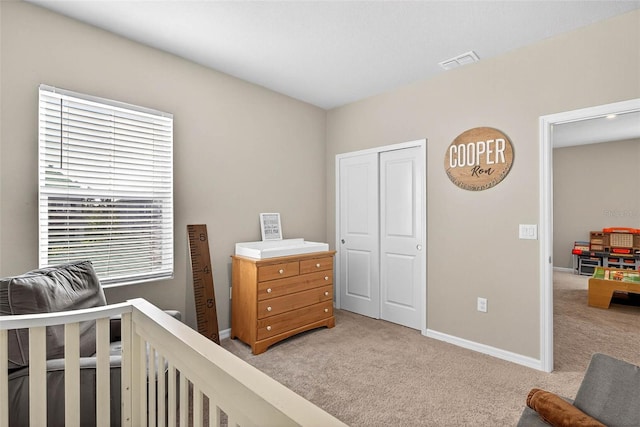 33854 Floating Heart Ct, Wesley Chapel, FL 33545 - bedroom featuring light carpet and a closet