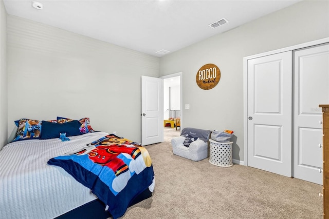 33854 Floating Heart Ct, Wesley Chapel, FL 33545 - bedroom with carpet flooring and a closet