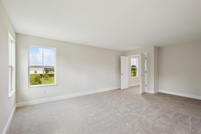 12758 Oak Hill Way, Parrish, FL 34219 - spare room featuring carpet floors