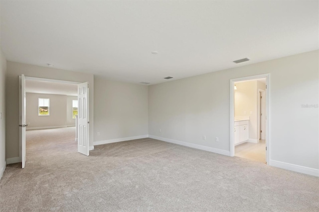 12758 Oak Hill Way, Parrish, FL 34219 - unfurnished room with light colored carpet