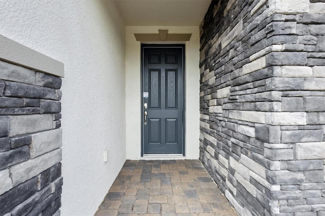 12758 Oak Hill Way, Parrish, FL 34219 - entrance to property featuring stucco siding and stone siding