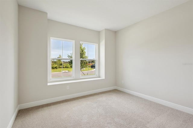 12758 Oak Hill Way, Parrish, FL 34219 - carpeted empty room with baseboards
