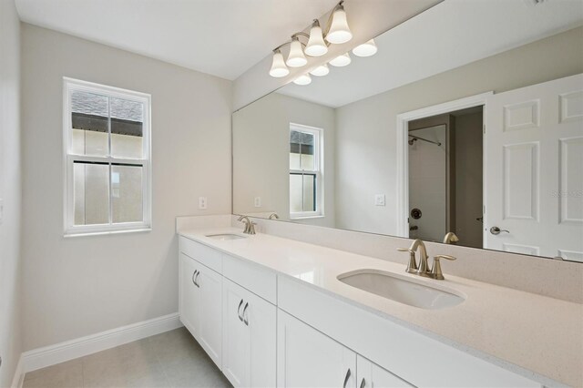 12758 Oak Hill Way, Parrish, FL 34219 - bathroom with double vanity and a shower