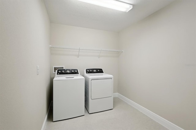 12758 Oak Hill Way, Parrish, FL 34219 - washroom with washing machine and clothes dryer and baseboards