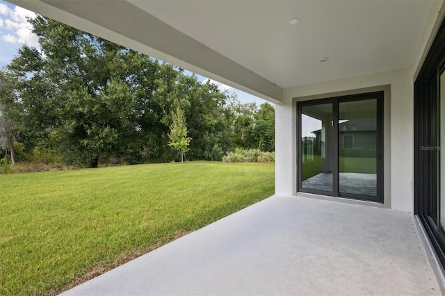 12758 Oak Hill Way, Parrish, FL 34219 - view of grassy yard featuring a patio and view of scattered trees