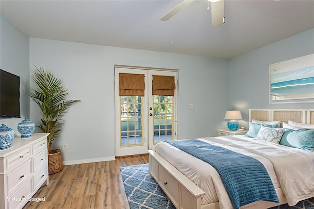 9660 Tara Cay Ct Unit 38, Seminole, FL 33776 - bedroom featuring access to outside, french doors, light wood-style floors, and a ceiling fan
