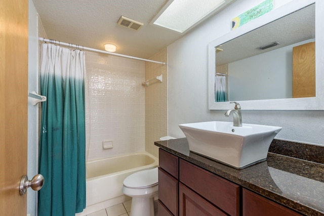 9660 Tara Cay Ct Unit 38, Seminole, FL 33776 - full bath with vanity, shower / bath combination with curtain, and tile patterned floors