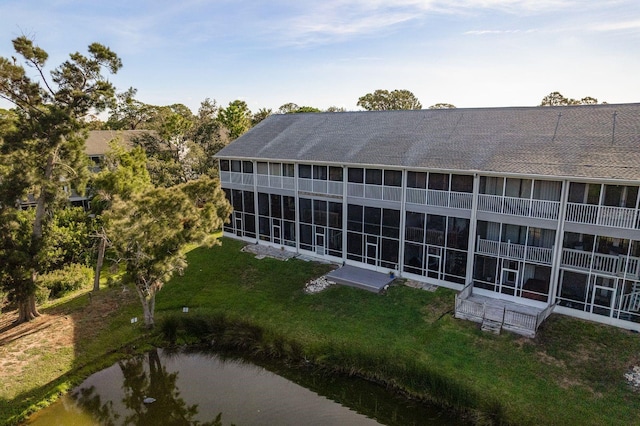 9660 Tara Cay Ct Unit 38, Seminole, FL 33776 - view of building exterior featuring a water view