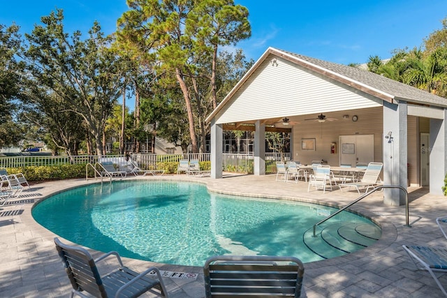 9660 Tara Cay Ct Unit 38, Seminole, FL 33776 - community pool featuring ceiling fan and a patio