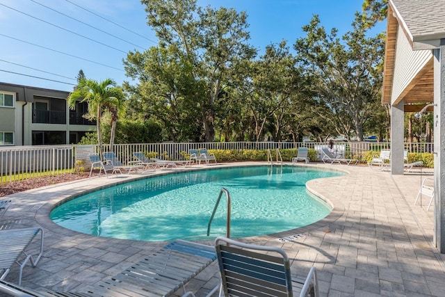 9660 Tara Cay Ct Unit 38, Seminole, FL 33776 - community pool with a patio