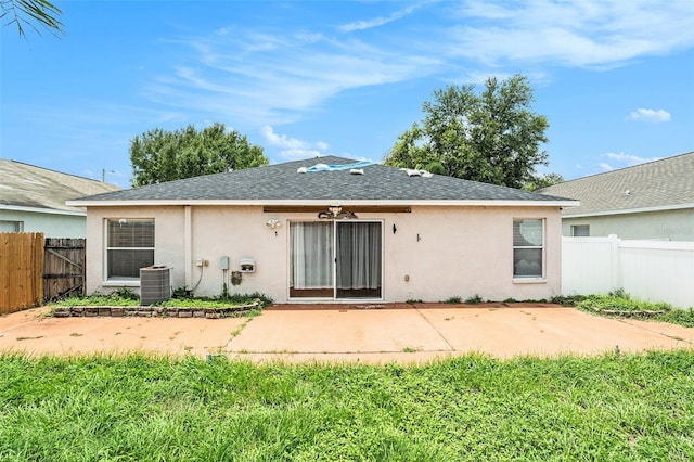 10039 Creek Bluff Dr, Riverview, FL 33578 - back of house featuring stucco siding, a patio area, and a shingled roof