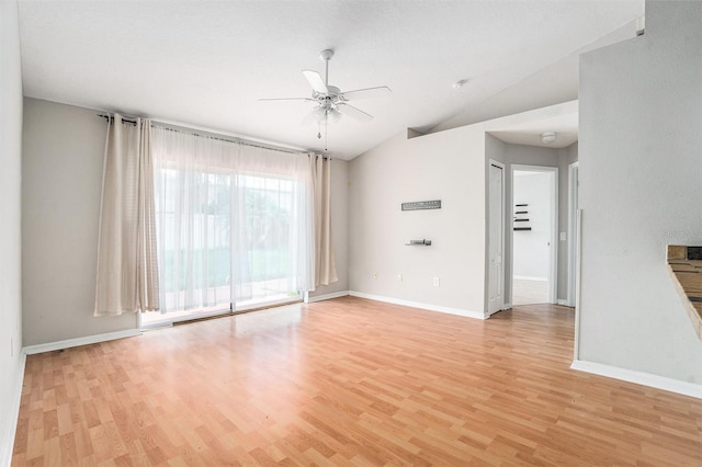10039 Creek Bluff Dr, Riverview, FL 33578 - unfurnished room featuring lofted ceiling, ceiling fan, and light wood-style flooring