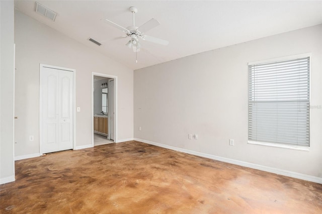 10039 Creek Bluff Dr, Riverview, FL 33578 - unfurnished bedroom with vaulted ceiling, concrete floors, ensuite bath, ceiling fan, and a closet
