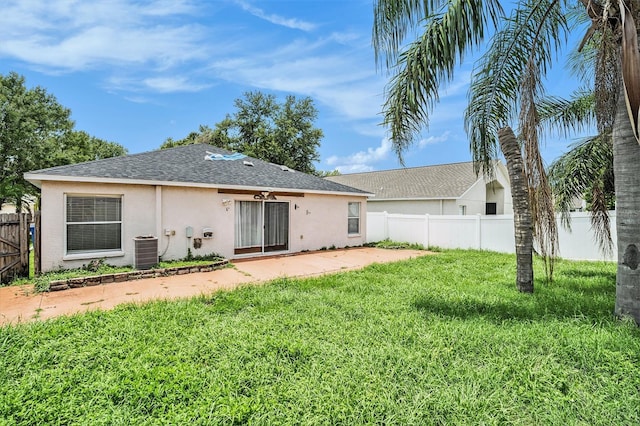 10039 Creek Bluff Dr, Riverview, FL 33578 - back of property with stucco siding, a fenced backyard, a patio area, and a shingled roof