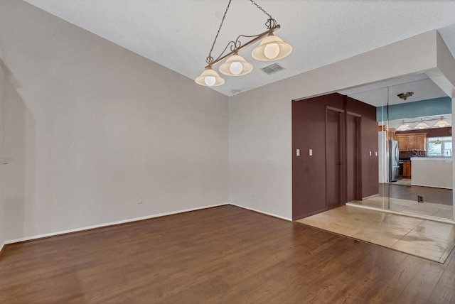 3902 Shoreside Cir, Tampa, FL 33624 - unfurnished dining area with wood finished floors and baseboards
