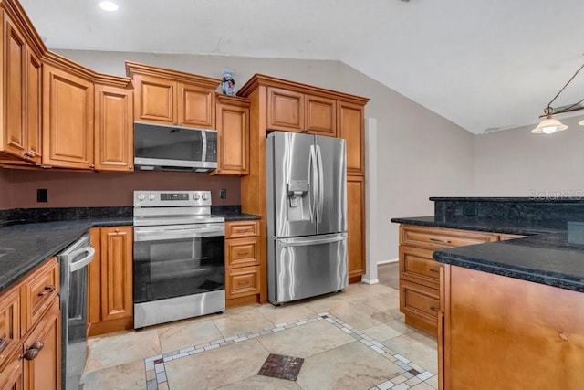 3902 Shoreside Cir, Tampa, FL 33624 - kitchen featuring stainless steel appliances, lofted ceiling, inlaid floor details, dark countertops, and brown cabinetry