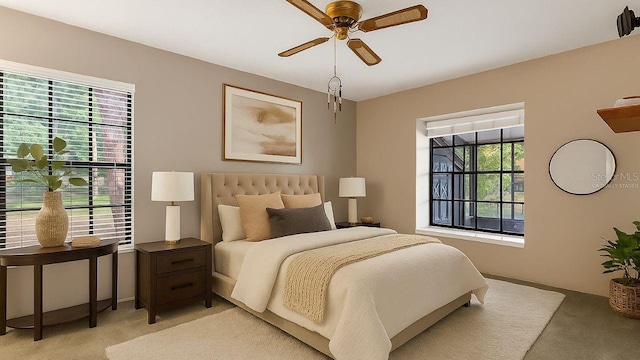 3902 Shoreside Cir, Tampa, FL 33624 - bedroom featuring light colored carpet and a ceiling fan