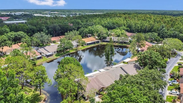 3902 Shoreside Cir, Tampa, FL 33624 - aerial overview of property's location featuring a heavily wooded area and a large body of water