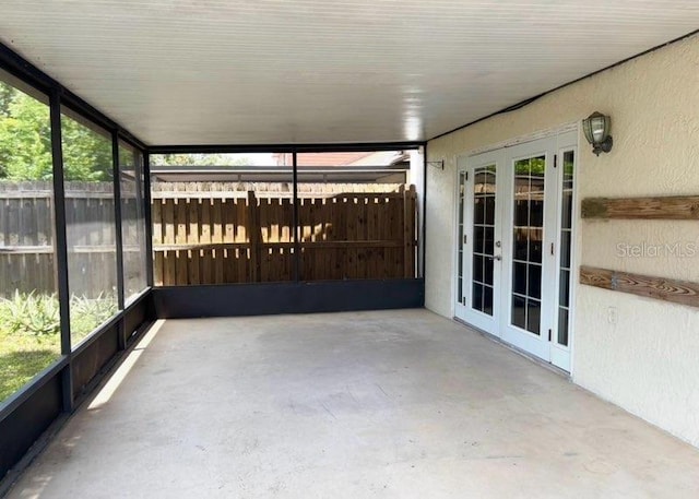 5110 Corvette Dr, Tampa, FL 33624 - unfurnished sunroom featuring french doors