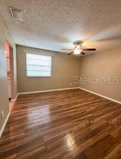5110 Corvette Dr, Tampa, FL 33624 - spare room with wood finished floors and a ceiling fan