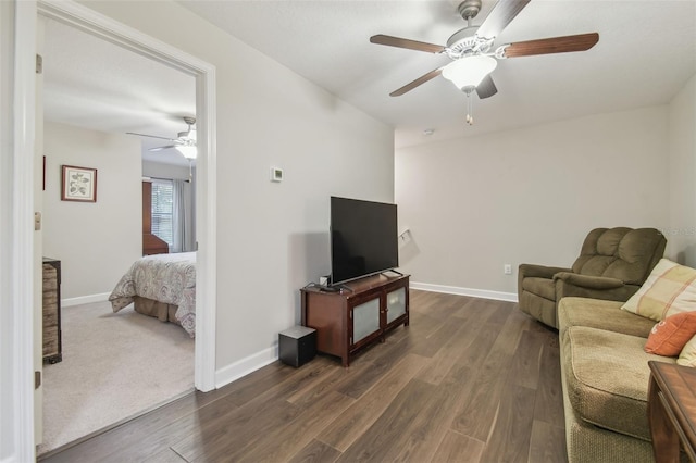 28568 Tranquil Lake Cir, Wesley Chapel, FL 33543 - living area with ceiling fan and dark wood-style floors