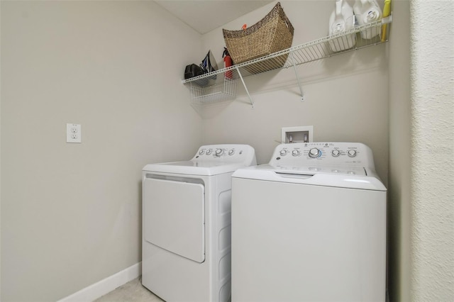 28568 Tranquil Lake Cir, Wesley Chapel, FL 33543 - washroom featuring washing machine and dryer and baseboards