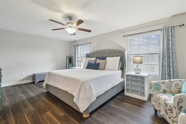 28568 Tranquil Lake Cir, Wesley Chapel, FL 33543 - bedroom with dark wood-style floors and a ceiling fan