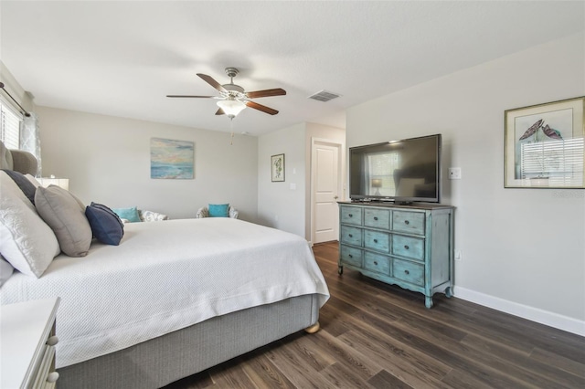 28568 Tranquil Lake Cir, Wesley Chapel, FL 33543 - bedroom featuring dark wood-type flooring and ceiling fan