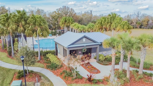 28568 Tranquil Lake Cir, Wesley Chapel, FL 33543 - view of building exterior with a community pool