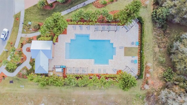 28568 Tranquil Lake Cir, Wesley Chapel, FL 33543 - aerial view of property and surrounding area featuring a pool