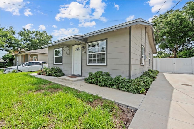 1743 Fulton Ave, Clearwater, FL 33755 - view of front of home featuring a gate