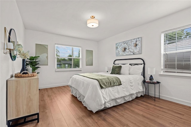 1743 Fulton Ave, Clearwater, FL 33755 - bedroom featuring wood finished floors and baseboards