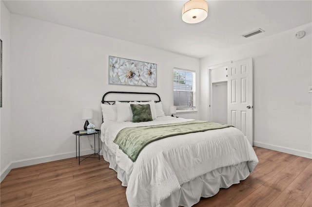 1743 Fulton Ave, Clearwater, FL 33755 - bedroom with wood finished floors and a closet
