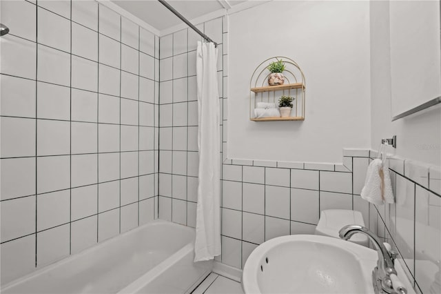 1743 Fulton Ave, Clearwater, FL 33755 - bathroom featuring shower / bath combo and tile walls