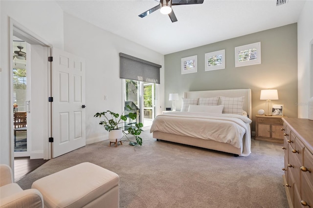 2182 Trevor Rd, Palm Harbor, FL 34683 - bedroom with access to outside, carpet, and ceiling fan