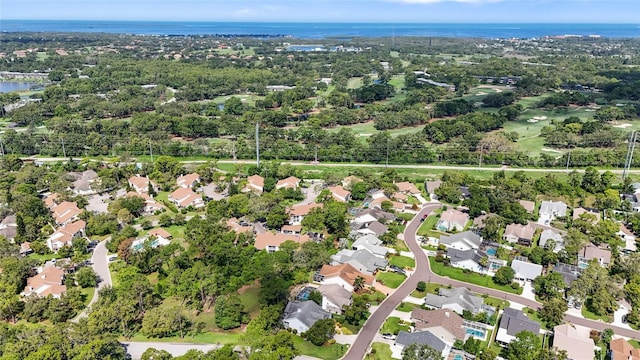 2182 Trevor Rd, Palm Harbor, FL 34683 - aerial view of property and surrounding area with a nearby body of water and nearby suburban area