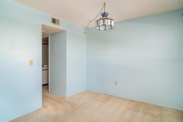 635 30th Ave W Unit F309, Bradenton, FL 34205 - unfurnished room featuring carpet flooring and a textured ceiling