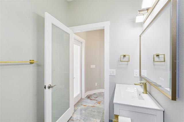 19113 Golden Cacoon Pl, Lutz, FL 33558 - bathroom with marble look tiles and vanity