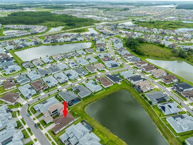 8749 Drummer Plank Dr, Wesley Chapel, FL 33545 - aerial view of property and surrounding area with a nearby body of water and nearby suburban area