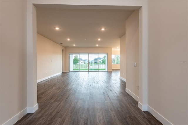 8749 Drummer Plank Dr, Wesley Chapel, FL 33545 - unfurnished room featuring dark wood-style flooring and recessed lighting