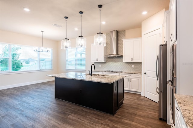 8749 Drummer Plank Dr, Wesley Chapel, FL 33545 - kitchen featuring wall chimney range hood, white cabinets, dark wood-style flooring, backsplash, and recessed lighting