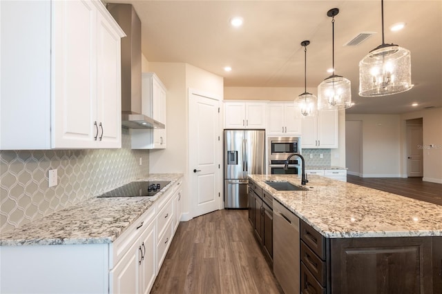 8749 Drummer Plank Dr, Wesley Chapel, FL 33545 - kitchen featuring stainless steel appliances, wall chimney exhaust hood, dark wood-style floors, white cabinetry, and recessed lighting